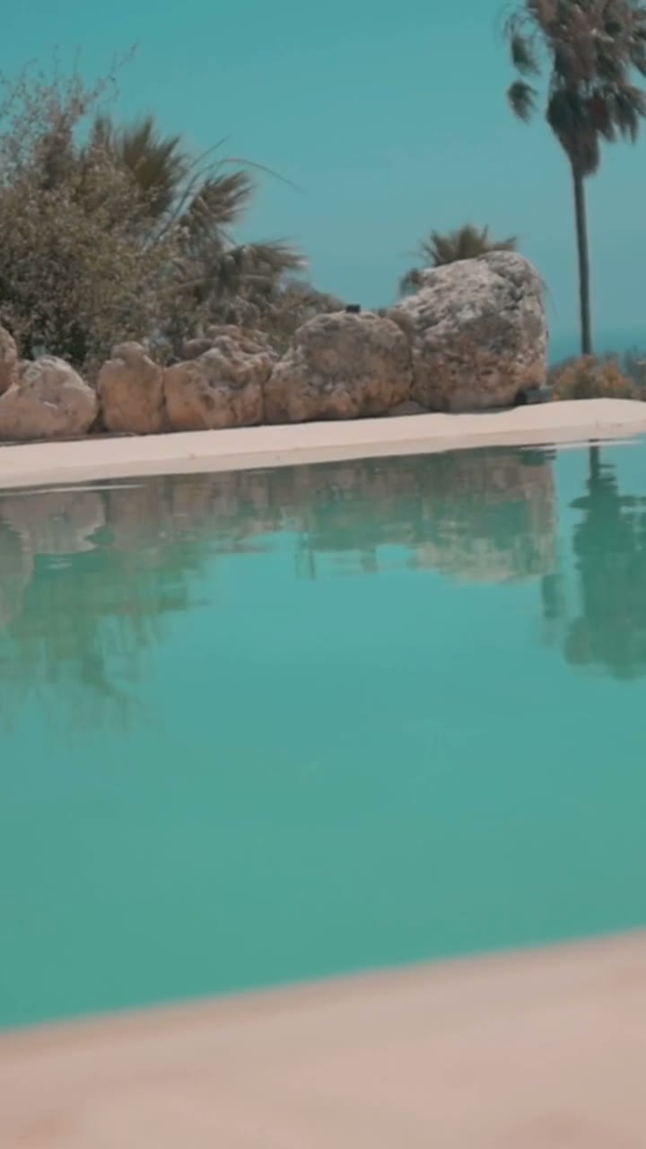 Pool and patio in bright daylight